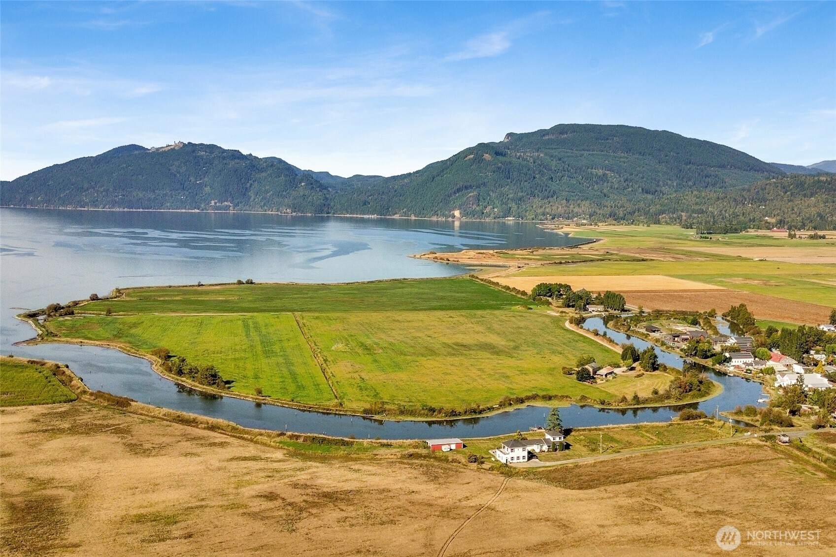 5544 Smith Road Bow, WA 98232 - Photo 2 of 40 a view of an ocean and a mountain