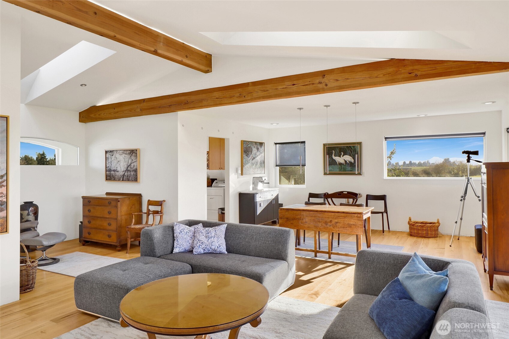 5544 Smith Road Bow, WA 98232 - Photo 22 of 40 a living room with furniture kitchen view and a table