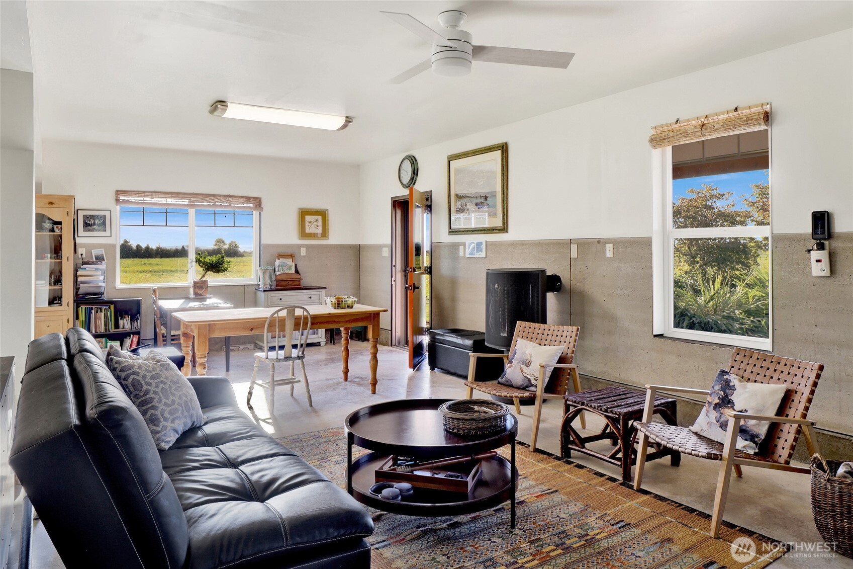 5544 Smith Road Bow, WA 98232 - Photo 33 of 40 a living room with furniture and a fireplace