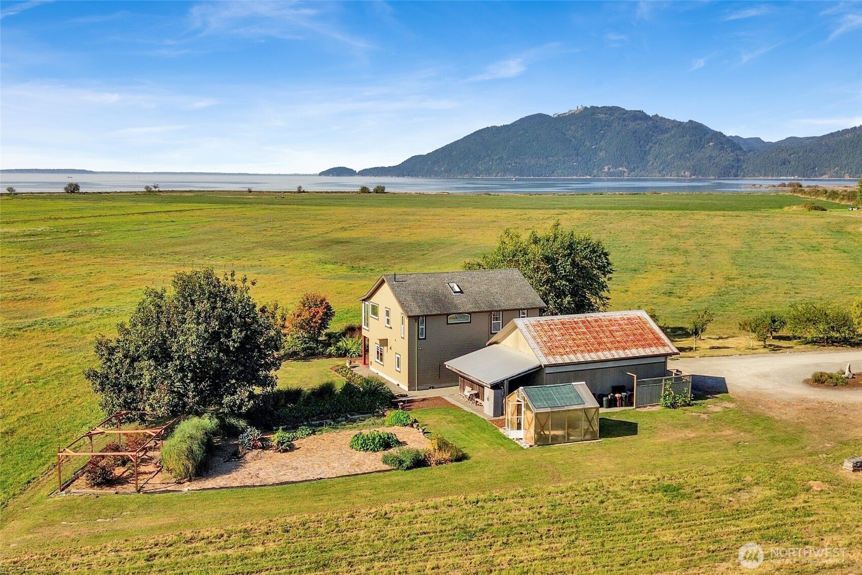 5544 Smith Road Bow, WA 98232 - Photo 35 of 40 a view of a city with an ocean beach