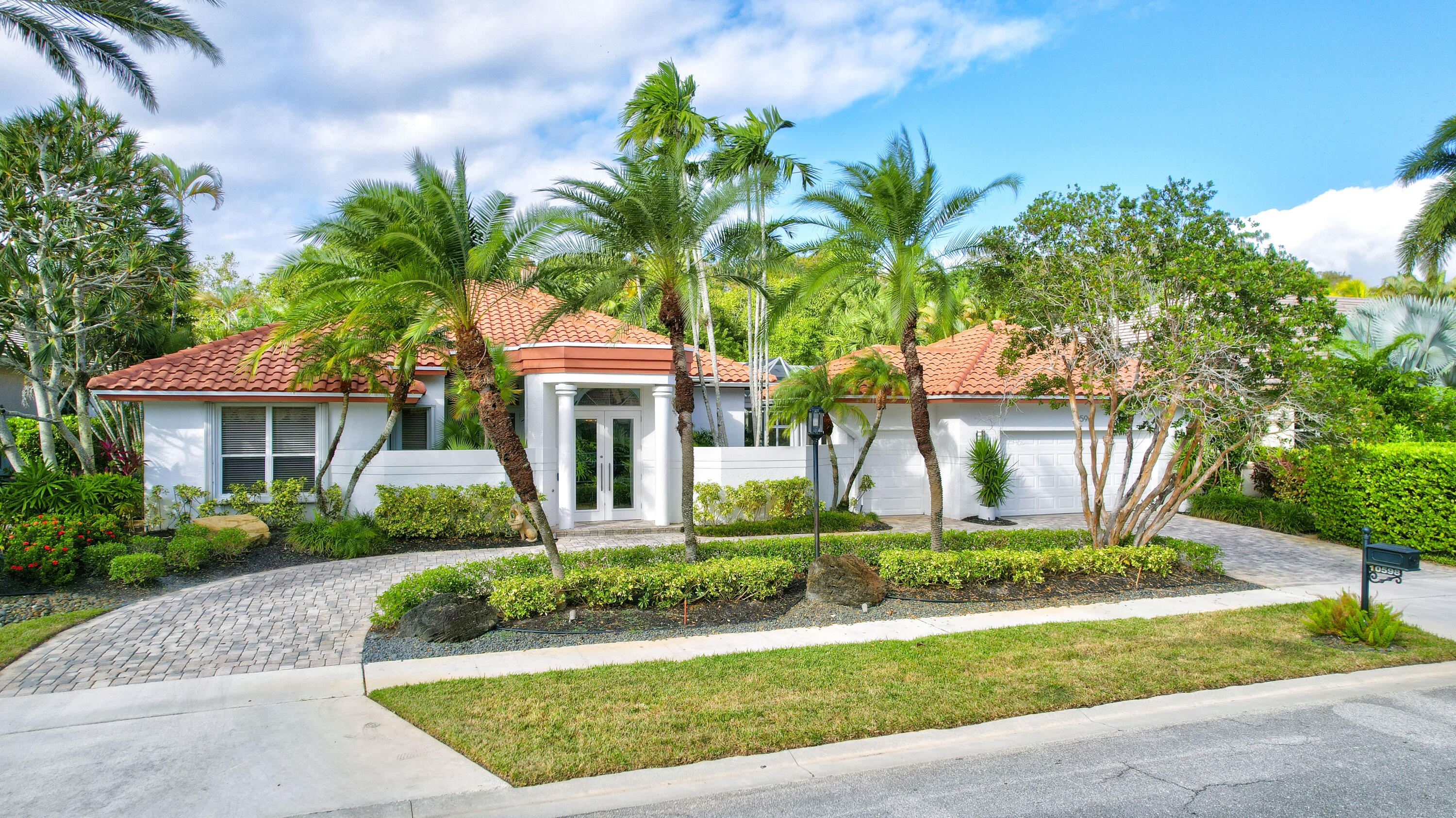 10598 Stonebridge Boulevard Boca Raton, FL 33498 - Photo 1 of 68 Beautiful curb appeal