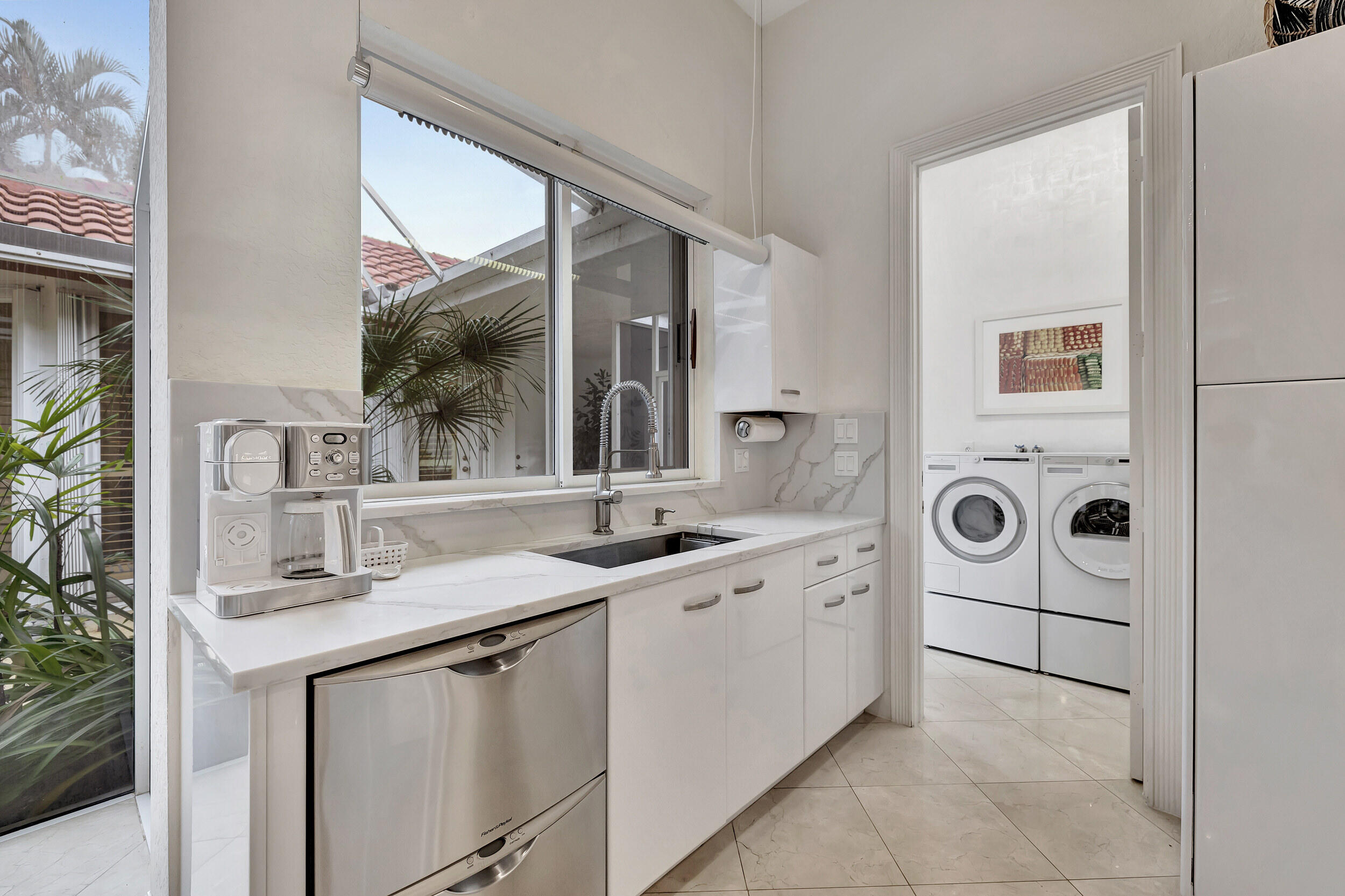 10598 Stonebridge Boulevard Boca Raton, FL 33498 - Photo 14 of 68 Entry to Laundry Room