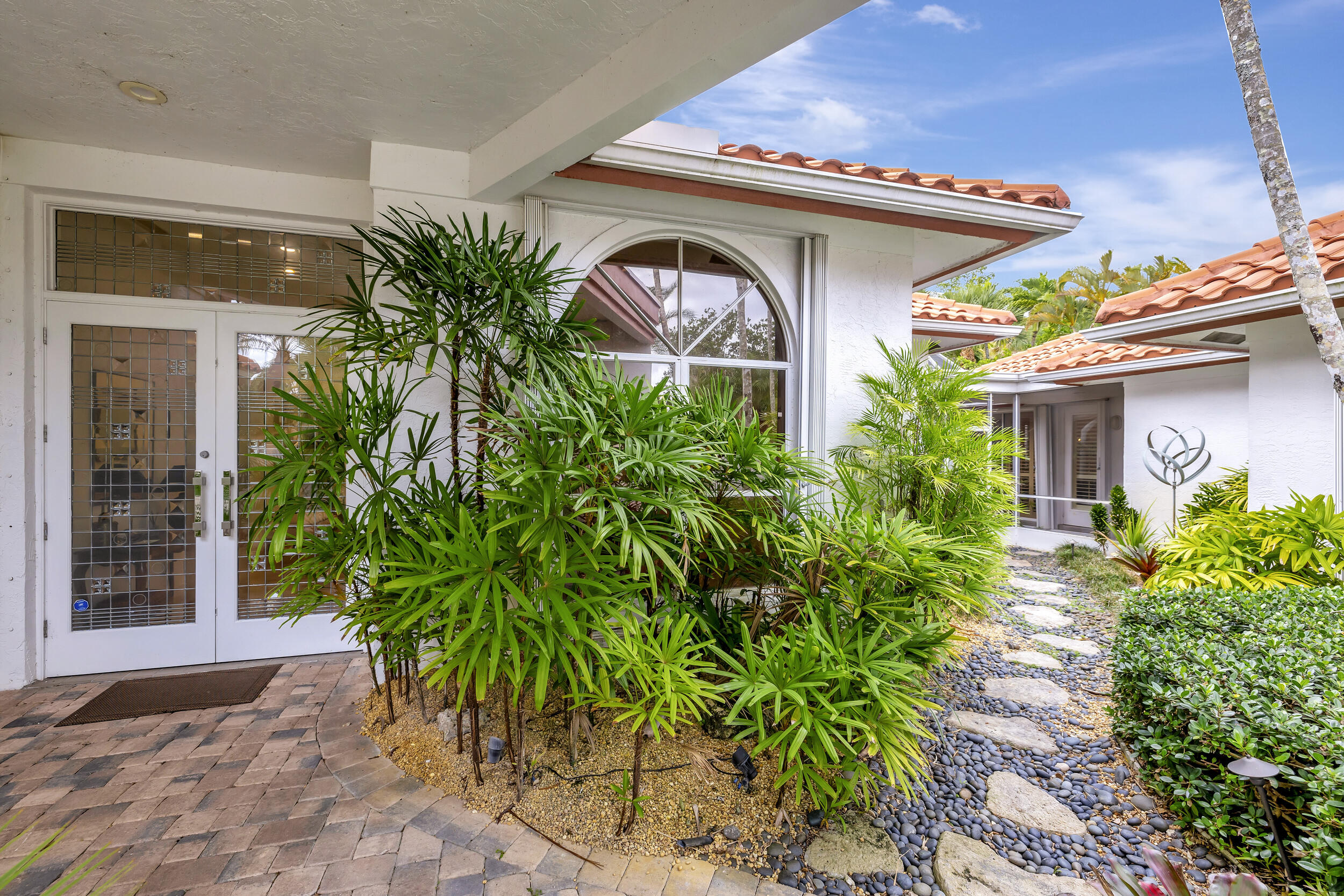 10598 Stonebridge Boulevard Boca Raton, FL 33498 - Photo 3 of 68 Zen Garden Entryway