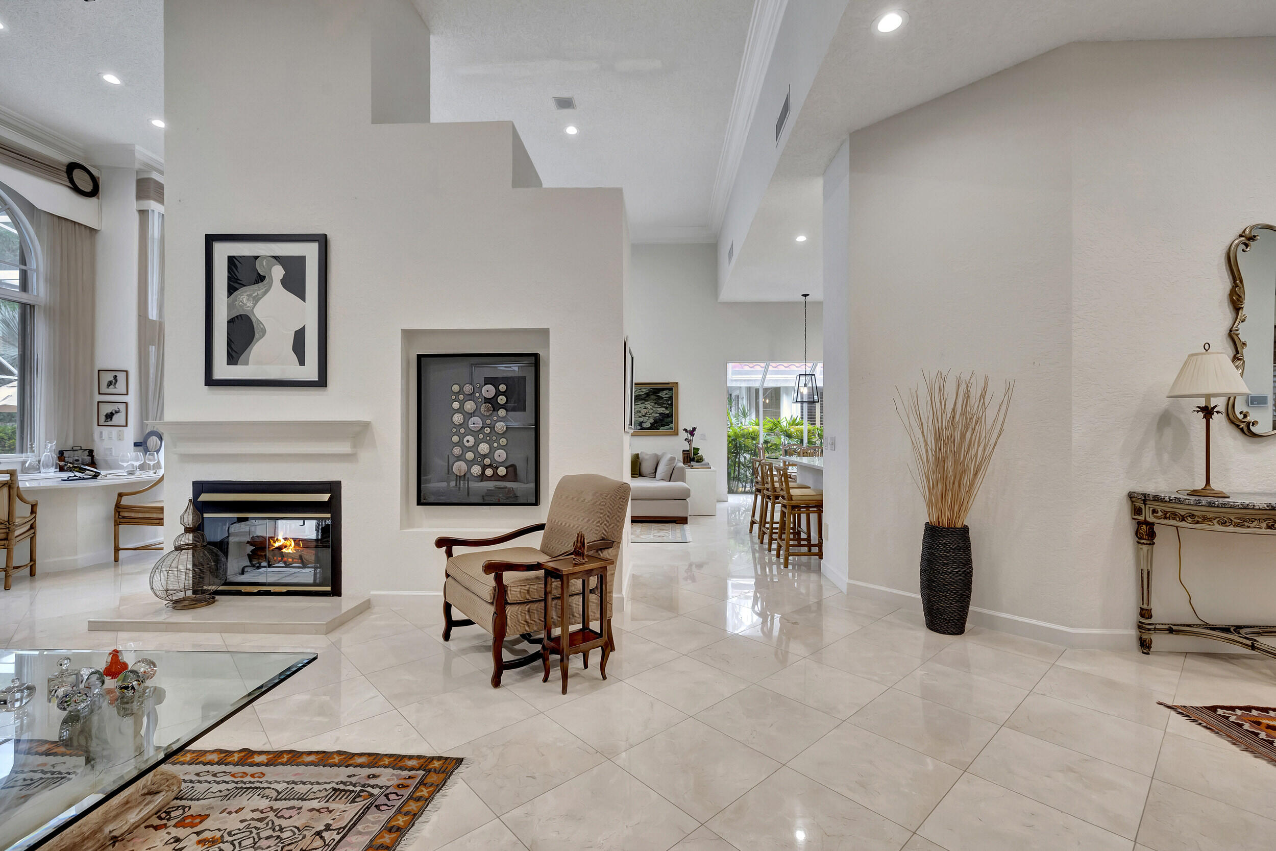10598 Stonebridge Boulevard Boca Raton, FL 33498 - Photo 49 of 68 Two-sided Fireplace