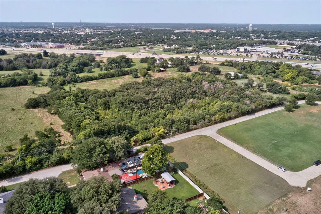 0 Dobbs Road Corinth, TX 76208 - Photo 13 of 16 Expansive undeveloped land parcel with significant tree coverage and clearings