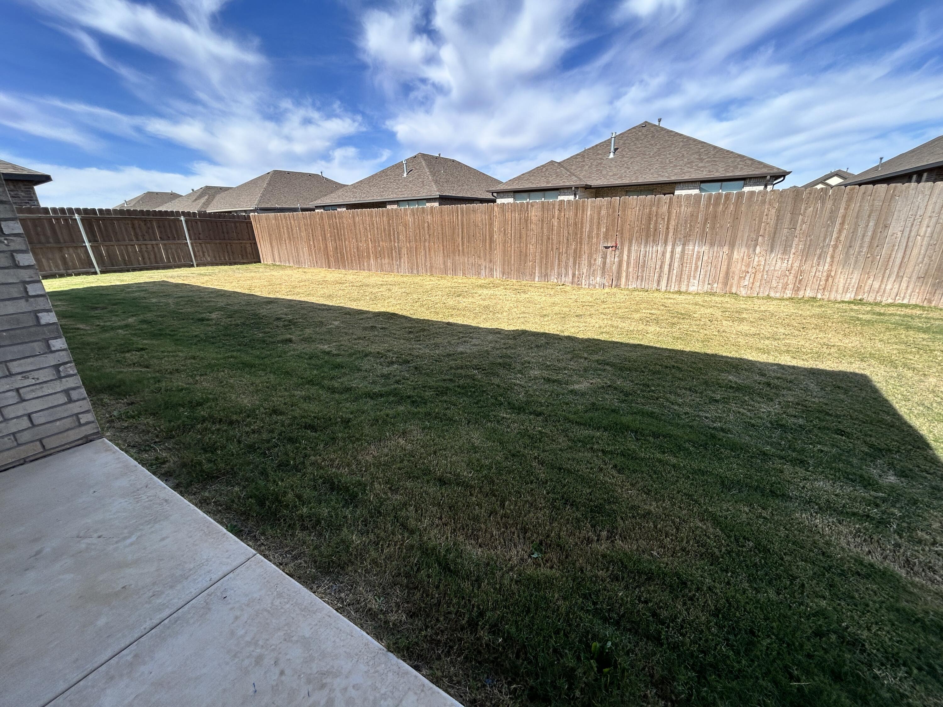 7612 61st Street Lubbock, TX 79407 - Photo 15 of 15 a view of a back yard of the house