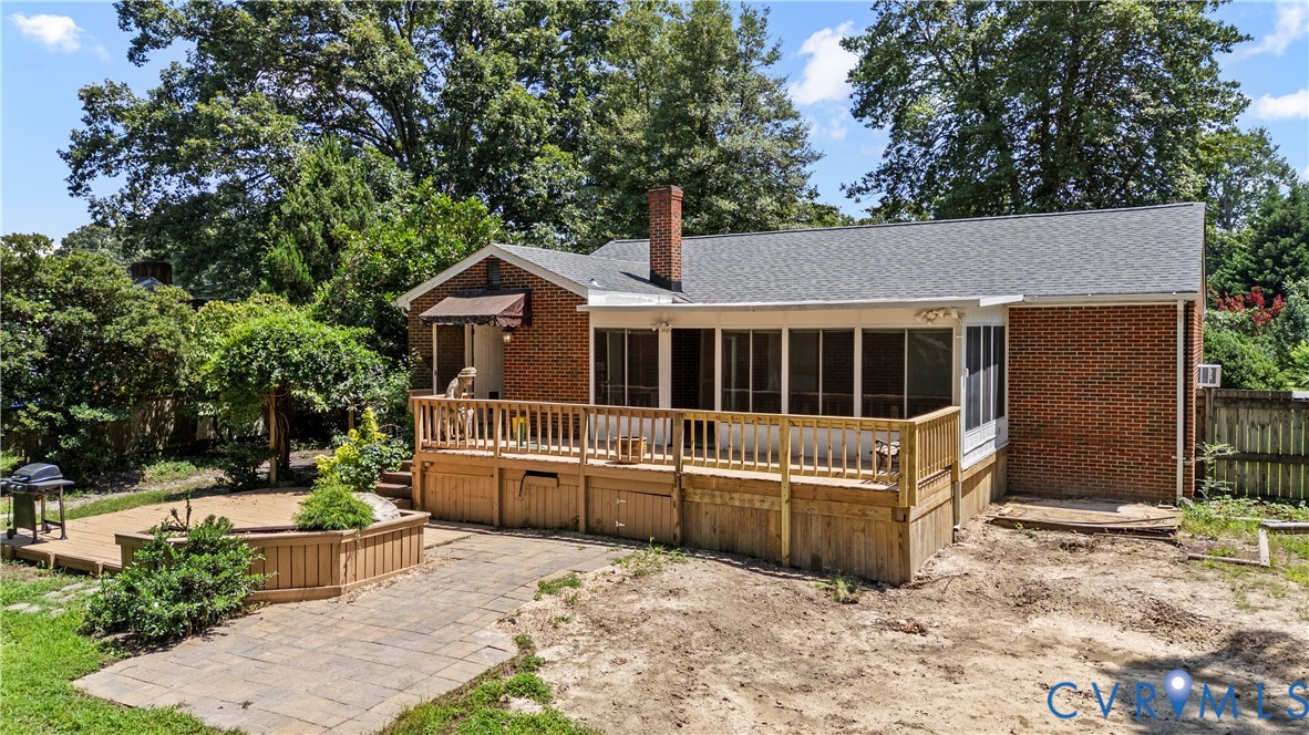 5436 Gilling Road Richmond, VA 23234 - Photo 6 of 33 Rear view of property with a deck, a chimney, bric
