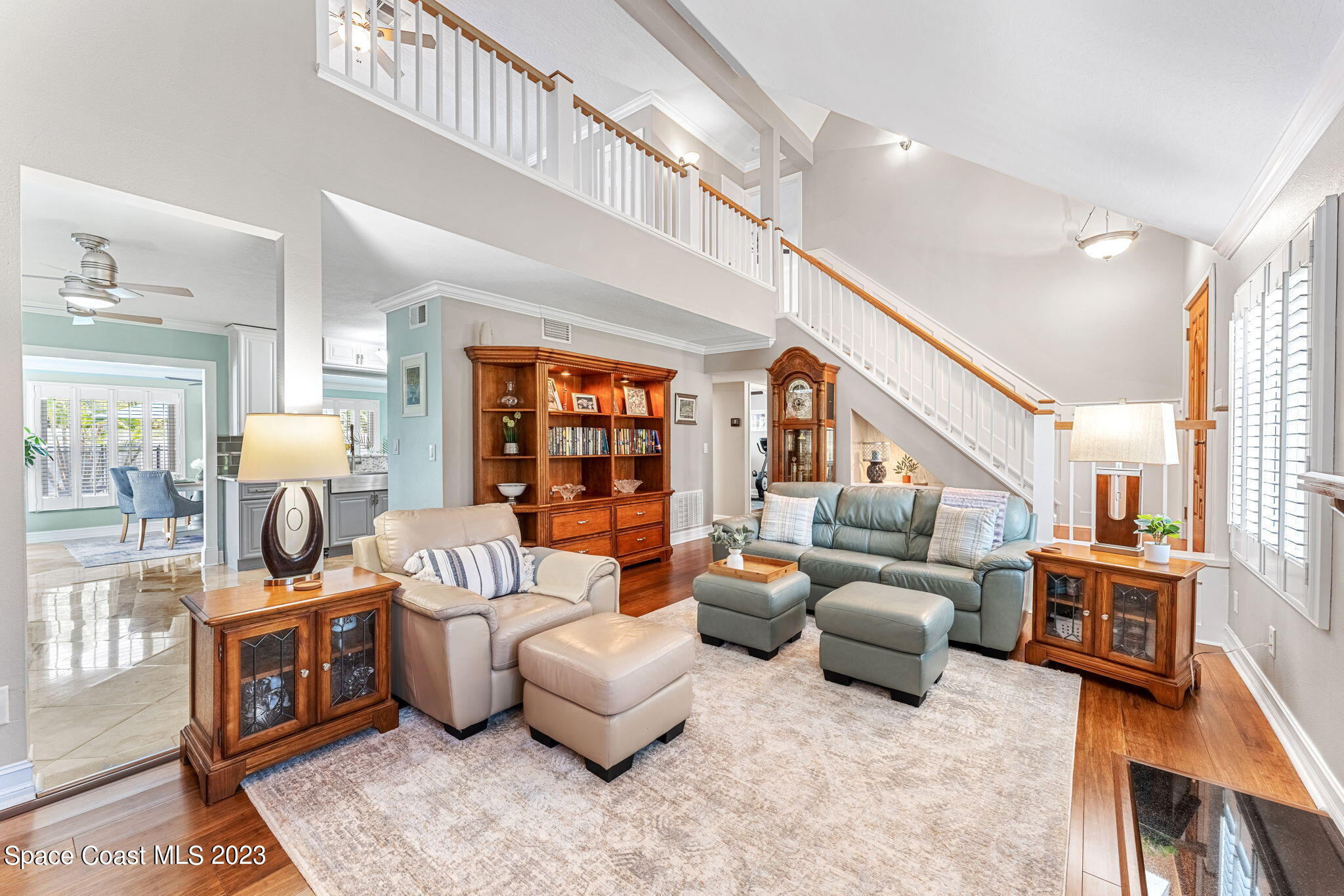 445 9th Avenue Indialantic, FL 32903 - Photo 10 of 62 a living room with furniture fireplace and a large window
