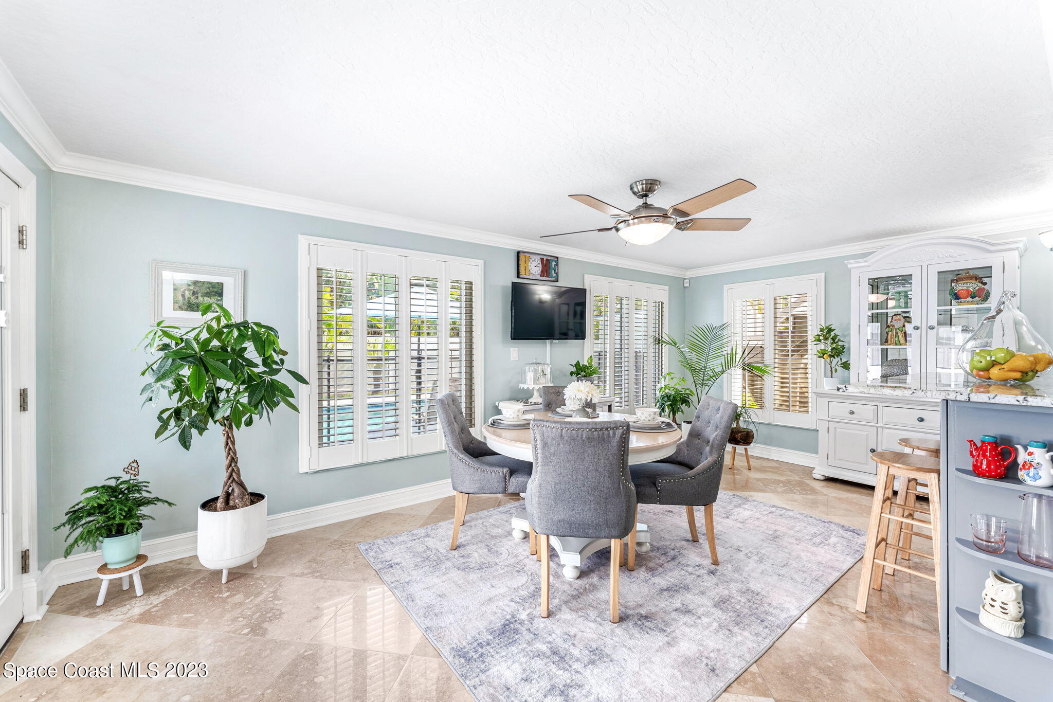 445 9th Avenue Indialantic, FL 32903 - Photo 18 of 62 a view of a dining room with furniture window and wooden floor