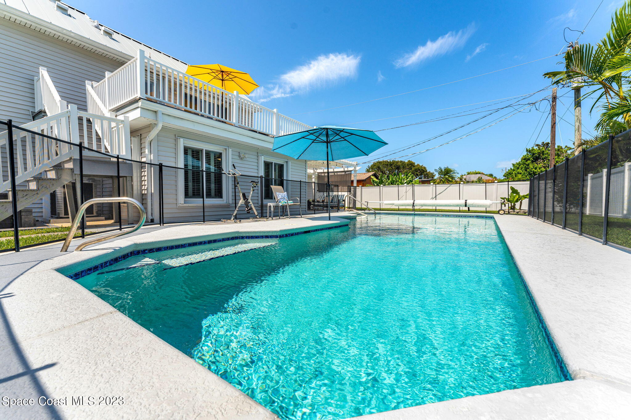 445 9th Avenue Indialantic, FL 32903 - Photo 41 of 62 a view of a house with swimming pool