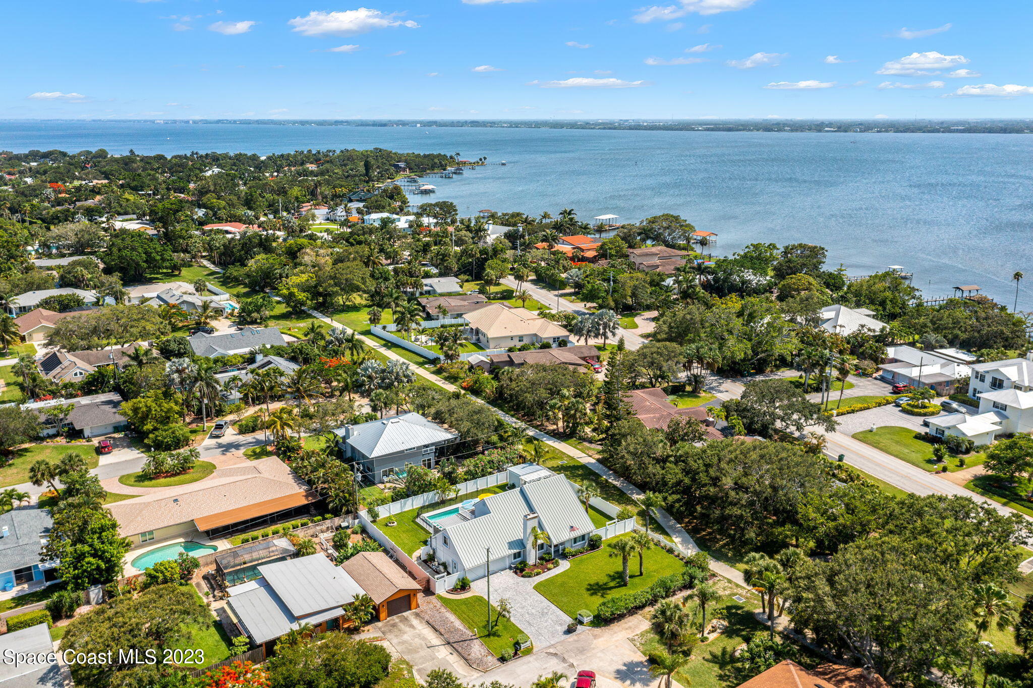 445 9th Avenue Indialantic, FL 32903 - Photo 58 of 62 an aerial view of a city with ocean view