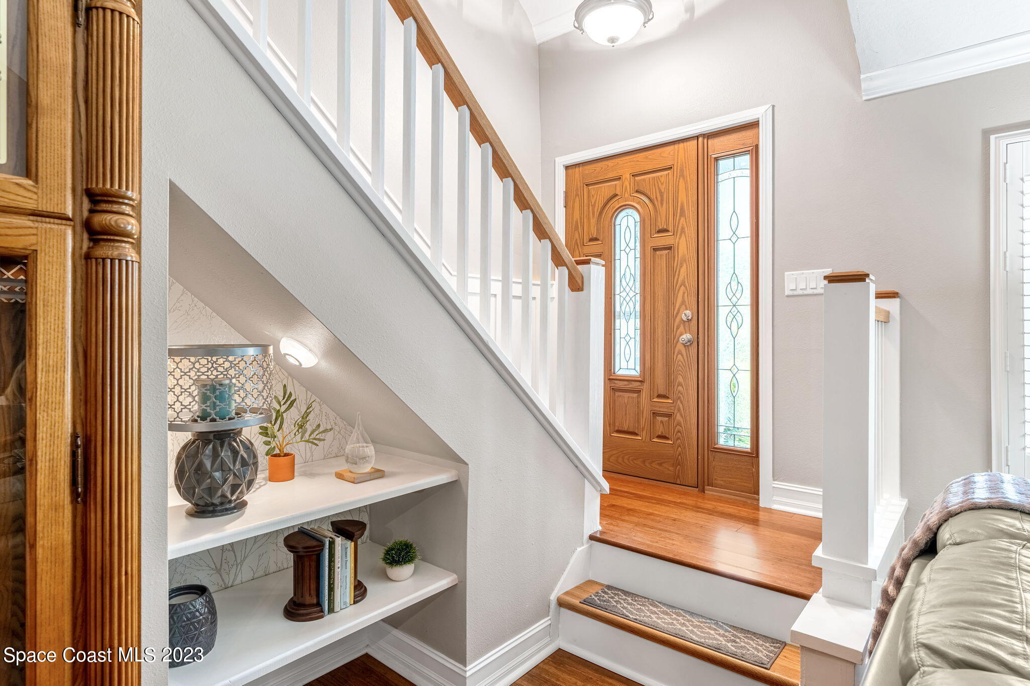 445 9th Avenue Indialantic, FL 32903 - Photo 6 of 62 a view of a hallway with wooden floor and entryway