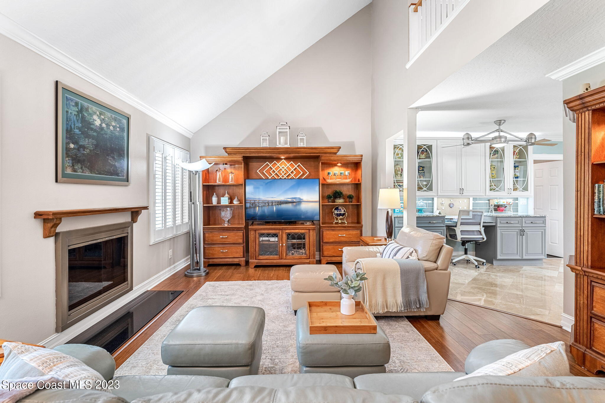 445 9th Avenue Indialantic, FL 32903 - Photo 9 of 62 a living room with furniture and a fireplace
