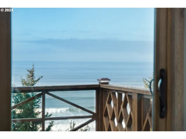 a view of balcony with furniture