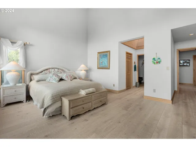 a bathroom with a sink double vanity granite and a mirror