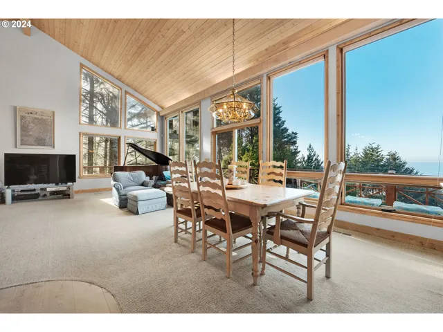 a view of a living room with furniture