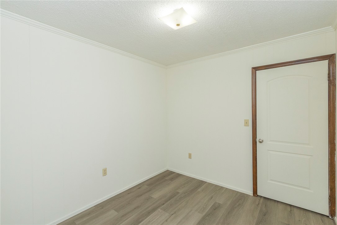 417 Greenmeadow Circle Anderson, SC 29626 - Photo 19 of 41 This spacious room features light LVP flooring. Perfect for office, hobby room or playroom. Access to the laundry room.