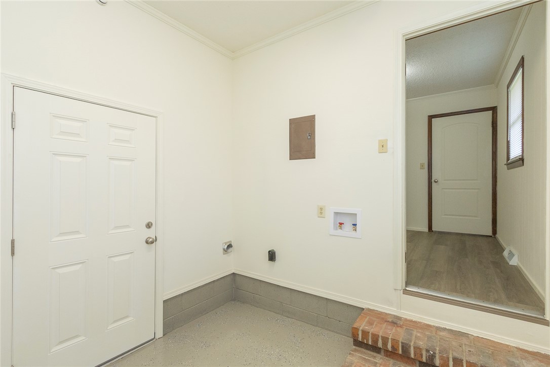 417 Greenmeadow Circle Anderson, SC 29626 - Photo 21 of 41 This functional laundry area features essential hookups and a convenient access to the carport.