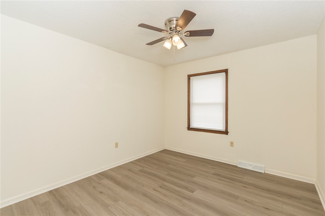 417 Greenmeadow Circle Anderson, SC 29626 - Photo 23 of 41 This spacious room features ample natural light and durable new LVP flooring, offering a comfortable living space. Fresh paint and new blinds.