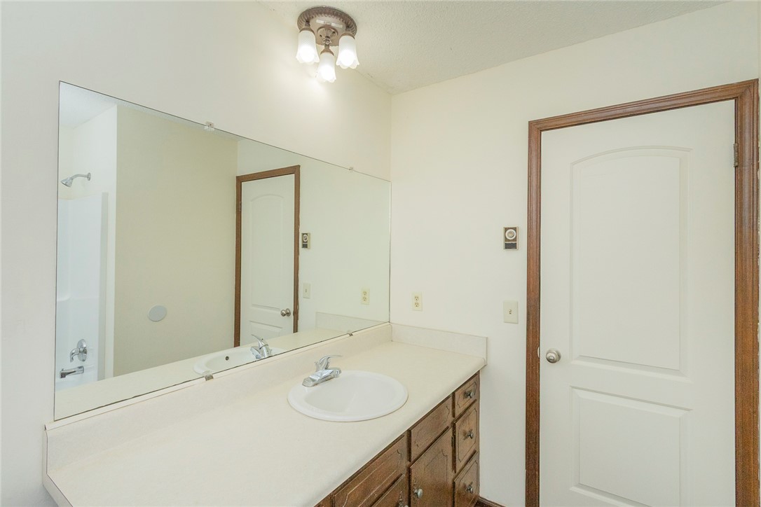 417 Greenmeadow Circle Anderson, SC 29626 - Photo 26 of 41 This bathroom features a functional vanity with a spacious countertop and a generously sized mirror.