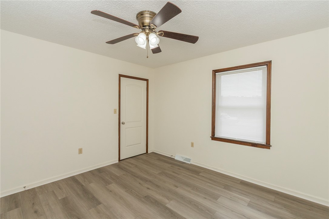 417 Greenmeadow Circle Anderson, SC 29626 - Photo 29 of 41 This bright room features a ceiling fan, a window with blinds, and durable LVP flooring.