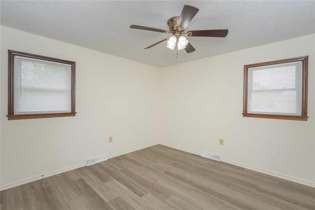 417 Greenmeadow Circle Anderson, SC 29626 - Photo 30 of 41 This spacious primary bedroom offers serene comfort and bright natural light with two windows. Fresh paint, new flooring and blinds.