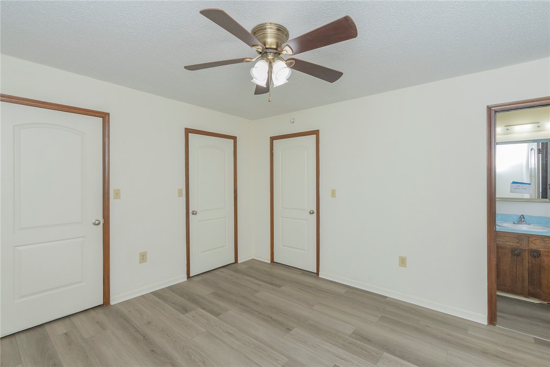 417 Greenmeadow Circle Anderson, SC 29626 - Photo 32 of 41 This airy primary bedroom features sleek flooring and a convenient attached bathroom and two closets.