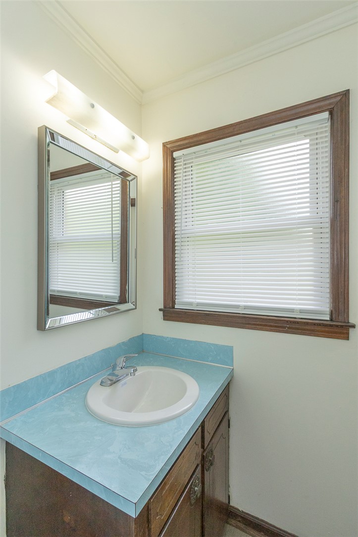 417 Greenmeadow Circle Anderson, SC 29626 - Photo 34 of 41 A well-lit primary bathroom features a functional vanity and window with new privacy blinds.