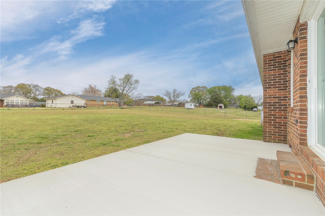 417 Greenmeadow Circle Anderson, SC 29626 - Photo 41 of 41 This spacious backyard offers abundant green space and a simple patio area, perfect for outdoor enjoyment.