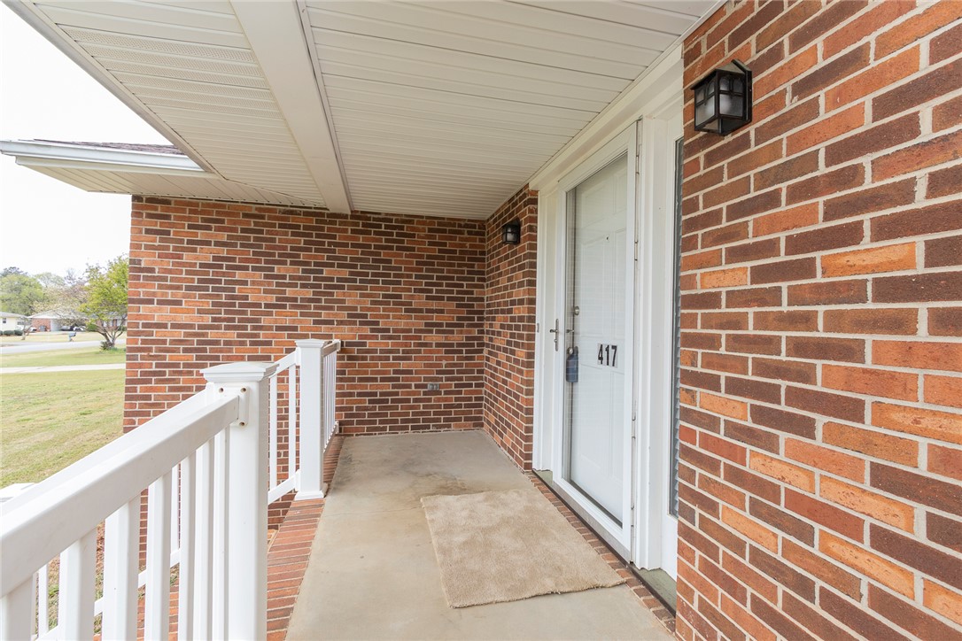 417 Greenmeadow Circle Anderson, SC 29626 - Photo 5 of 41 Welcome to a charming brick exterior with a welcoming porch, ready for your personal touch.