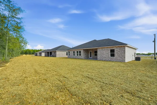 a front view of house with yard