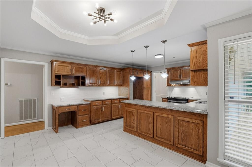 13 Bedford Ridge Northwest Cartersville, GA 30121 - Photo 4 of 19 a large kitchen with stainless steel appliances granite countertop a stove sink and cabinets