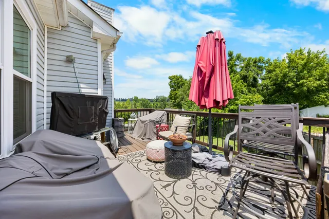 a view of a terrace with furniture