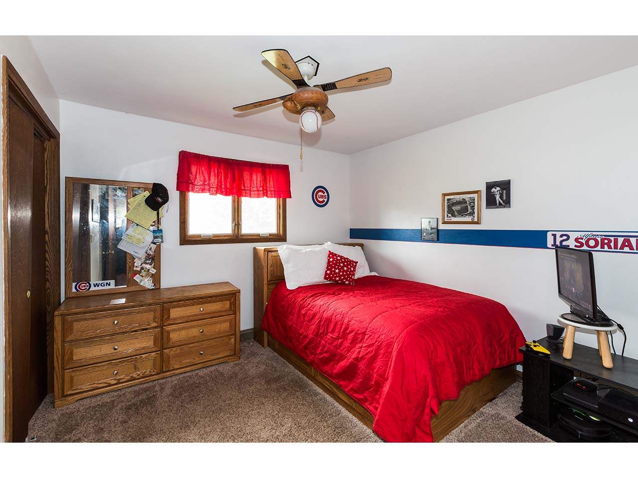 2952 Yale Bridge Road South Beloit, IL 61080 - Photo 15 of 22 a bed room with a bed and a ceiling fan
