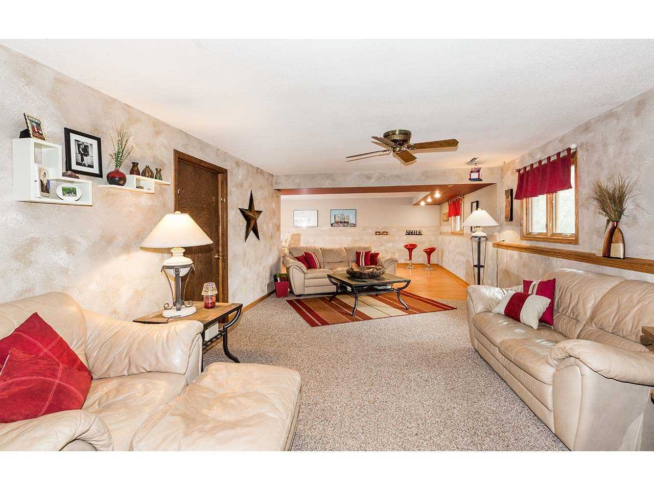 2952 Yale Bridge Road South Beloit, IL 61080 - Photo 16 of 22 a view of a livingroom with furniture and a couch