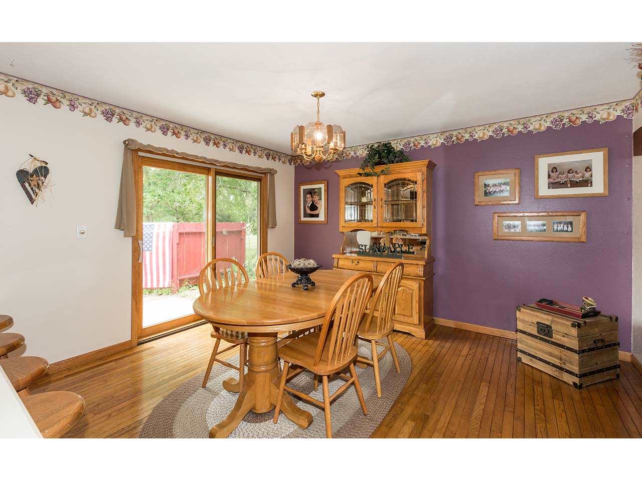 2952 Yale Bridge Road South Beloit, IL 61080 - Photo 6 of 22 a view of a dining room with furniture and chandelier