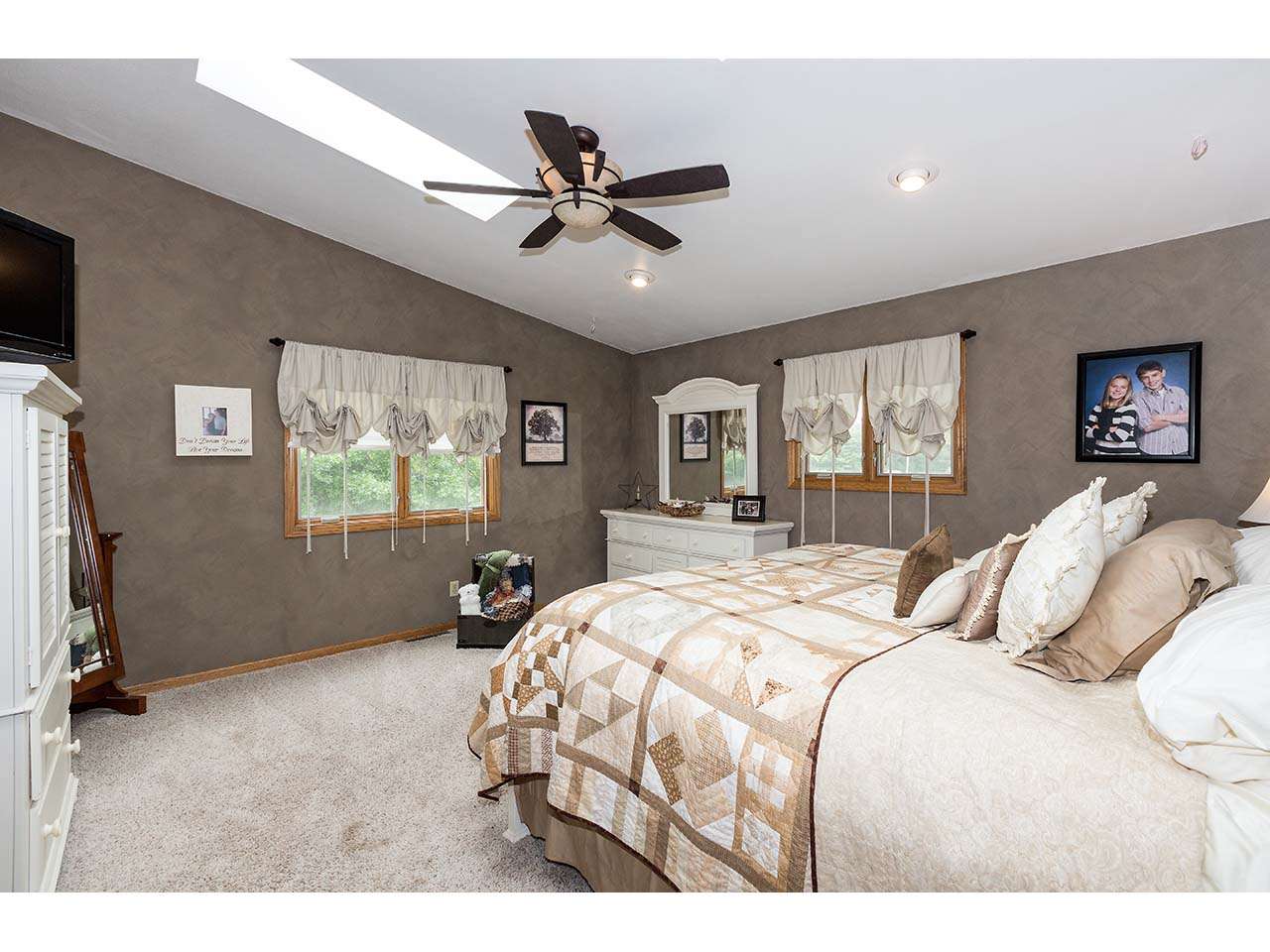 2952 Yale Bridge Road South Beloit, IL 61080 - Photo 7 of 22 a bedroom with a bed and a flat screen tv