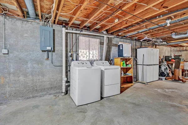 a view of an empty room with storage