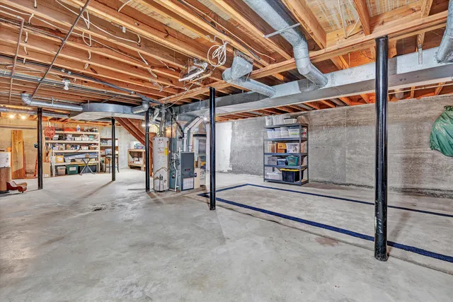 a room with storage and a utility room