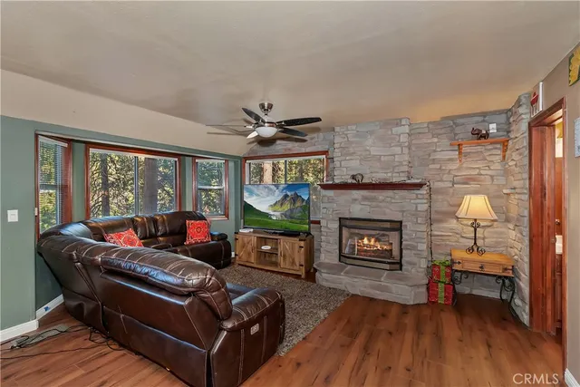 a view of a roof deck with table and chairs