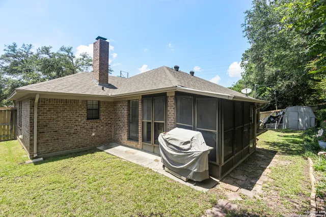 a front view of a house with large windows