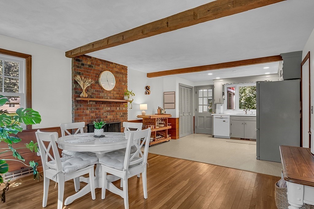 24 Whippletree Road Chelmsford, MA 01824 - Photo 13 of 34 a view of a dining room with furniture and wooden floor