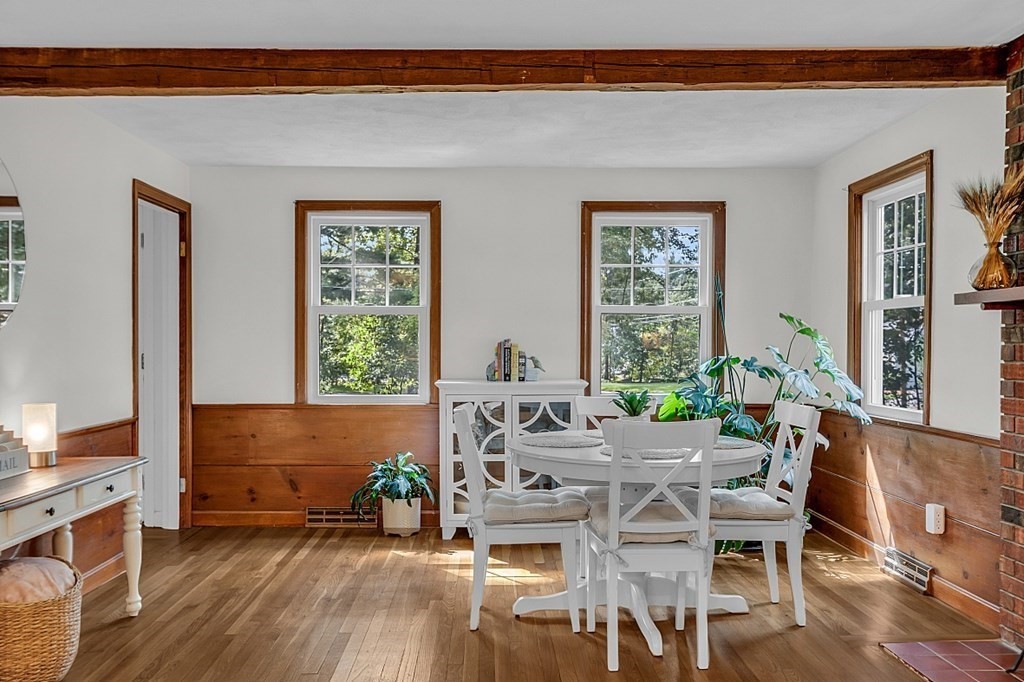 24 Whippletree Road Chelmsford, MA 01824 - Photo 15 of 34 a view of a dining room with furniture window and wooden floor