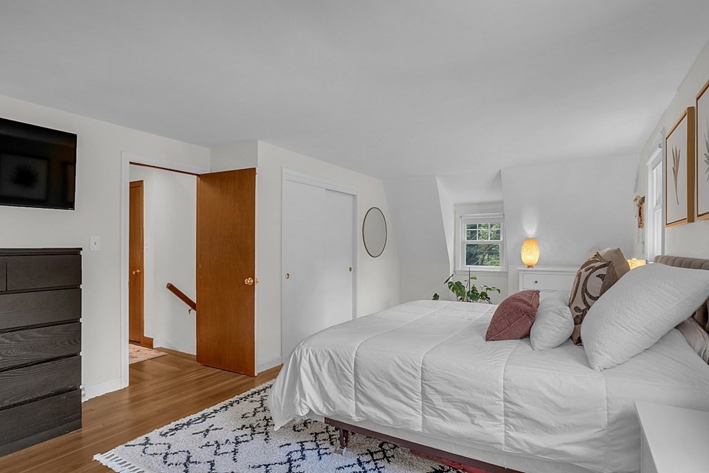 24 Whippletree Road Chelmsford, MA 01824 - Photo 25 of 34 a bedroom with a bed and a television