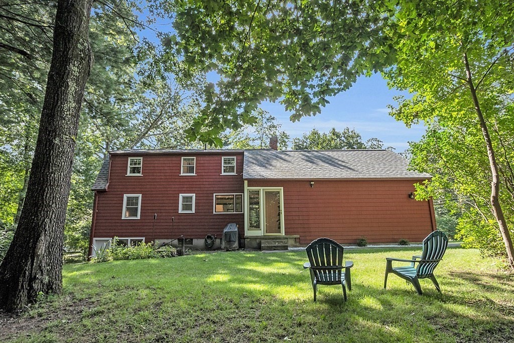24 Whippletree Road Chelmsford, MA 01824 - Photo 29 of 34 a brick house with a yard and front view of a house