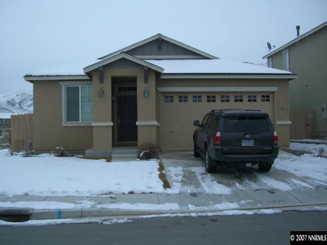 2305 Clementine Lane Reno, NV 89521 - Photo 1 of 9 a car parked in garage