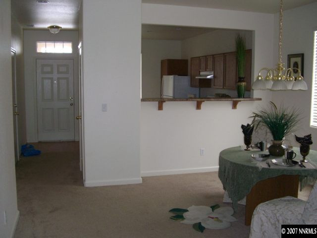 2305 Clementine Lane Reno, NV 89521 - Photo 7 of 9 a living room with furniture and a potted plant