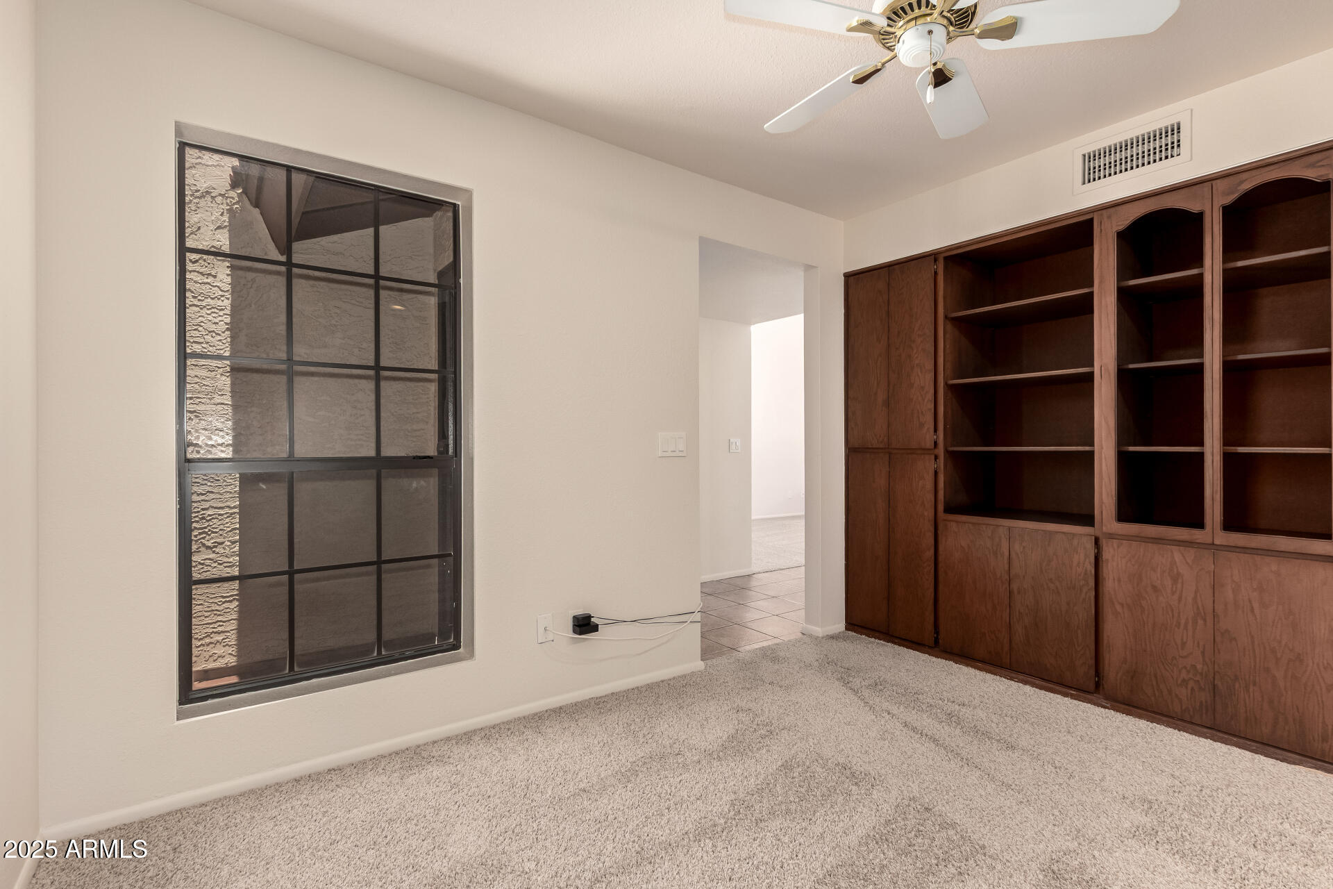 4313 North 29th Way Phoenix, AZ 85016 - Photo 20 of 31 Built-In Bookshelves & Large Window