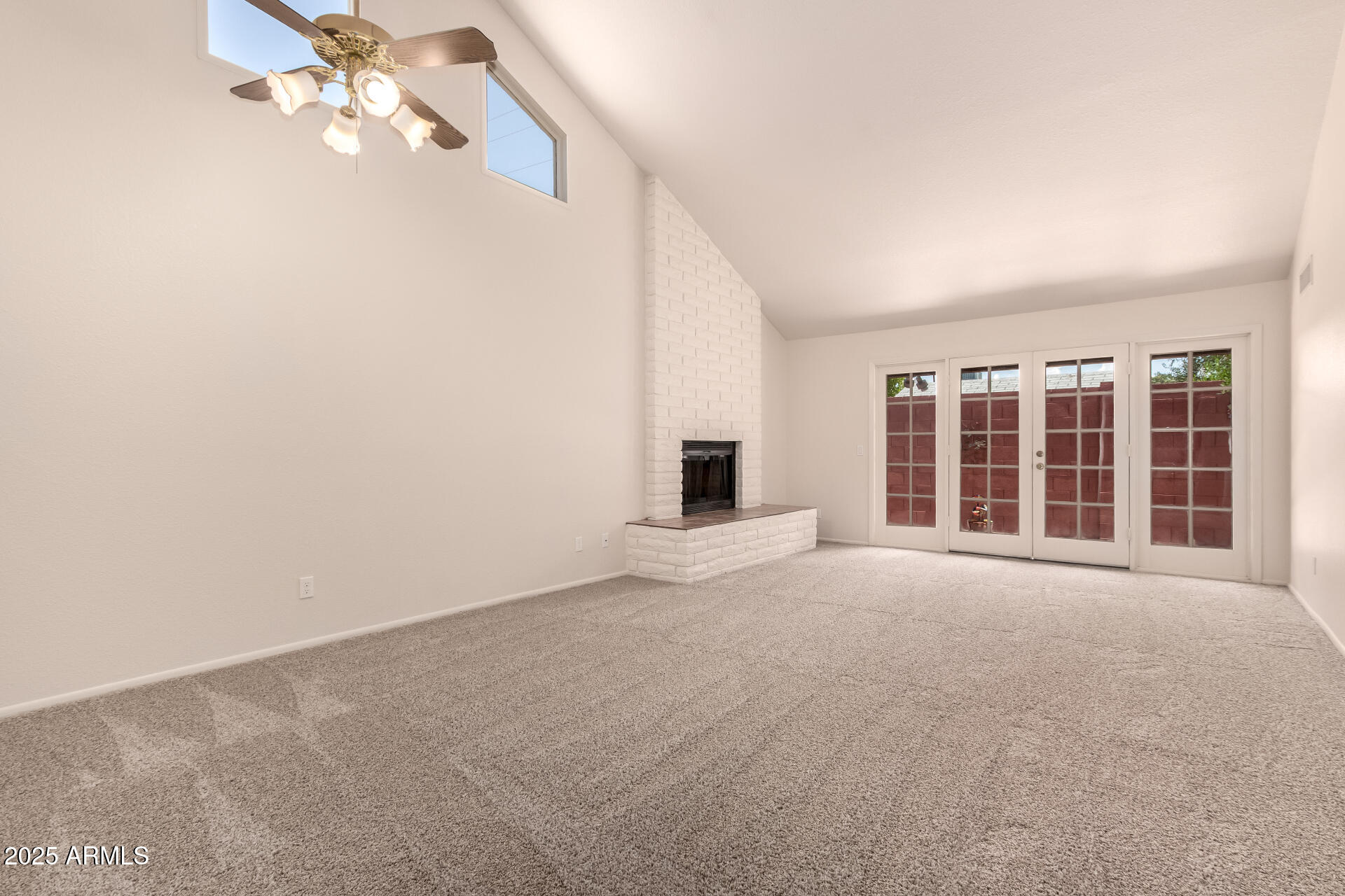 4313 North 29th Way Phoenix, AZ 85016 - Photo 8 of 31 Brick Fireplace & French Doors