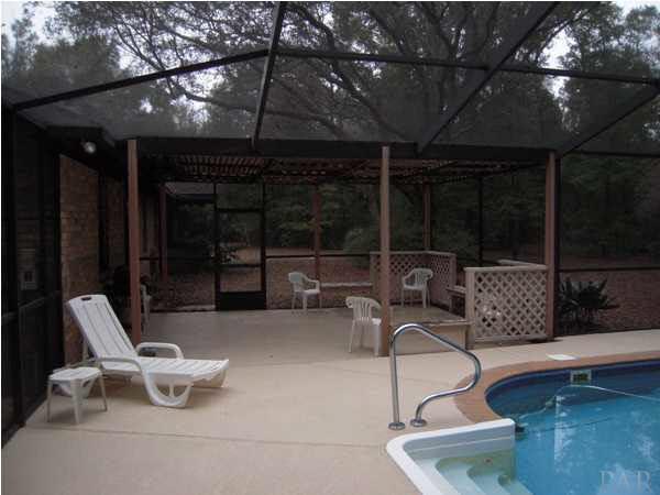 7732 Elrod Road Milton, FL 32583 - Photo 15 of 17 Enclosed Pool & Patio Area